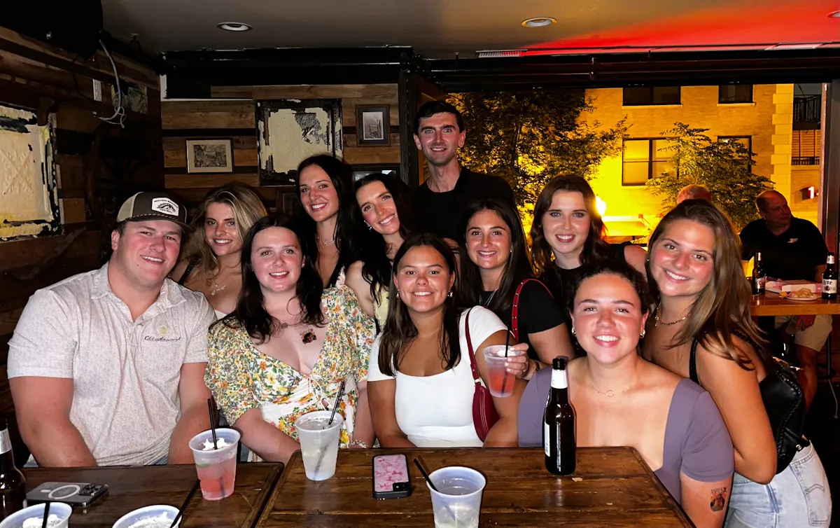 a group of people posing for a photo