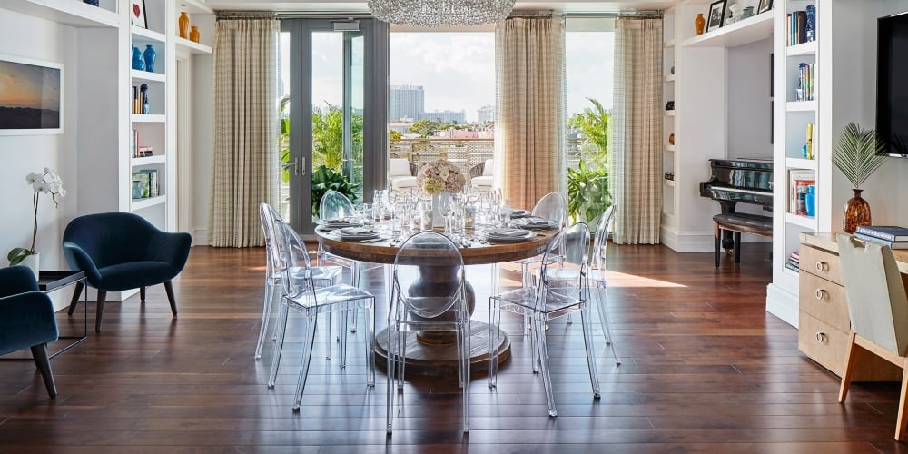 a dining room with tables and chairs