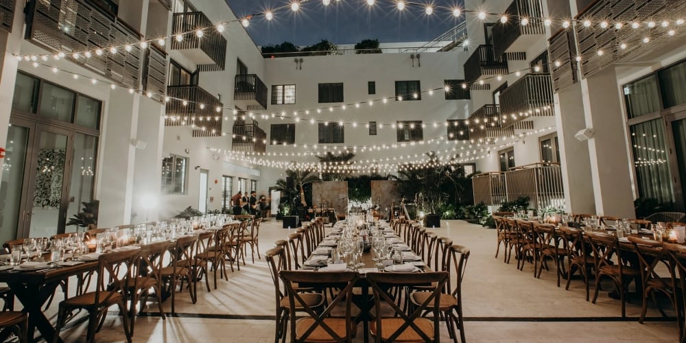 a dining room with tables and chairs