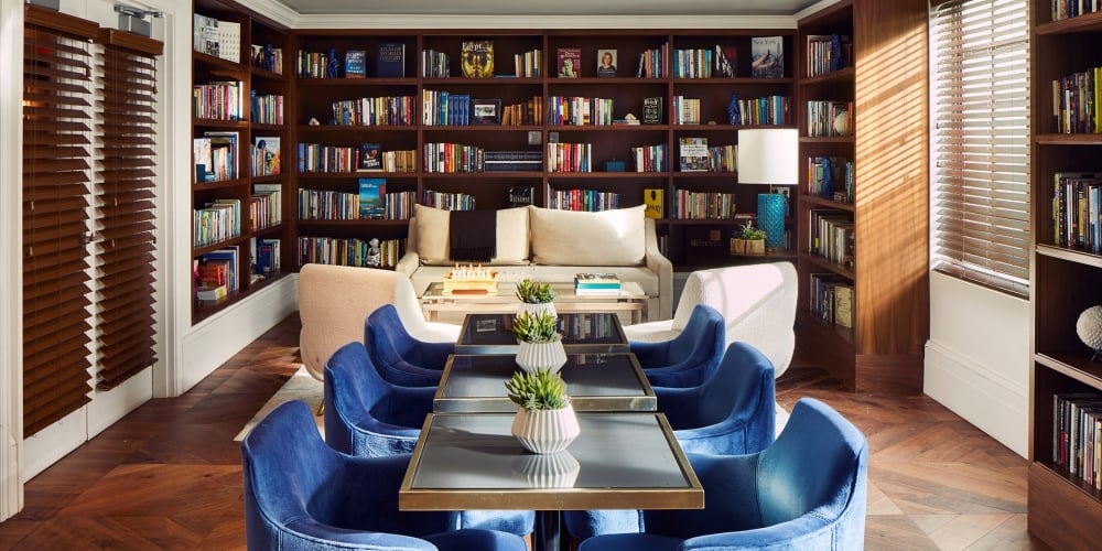 a dining room with tables and chairs