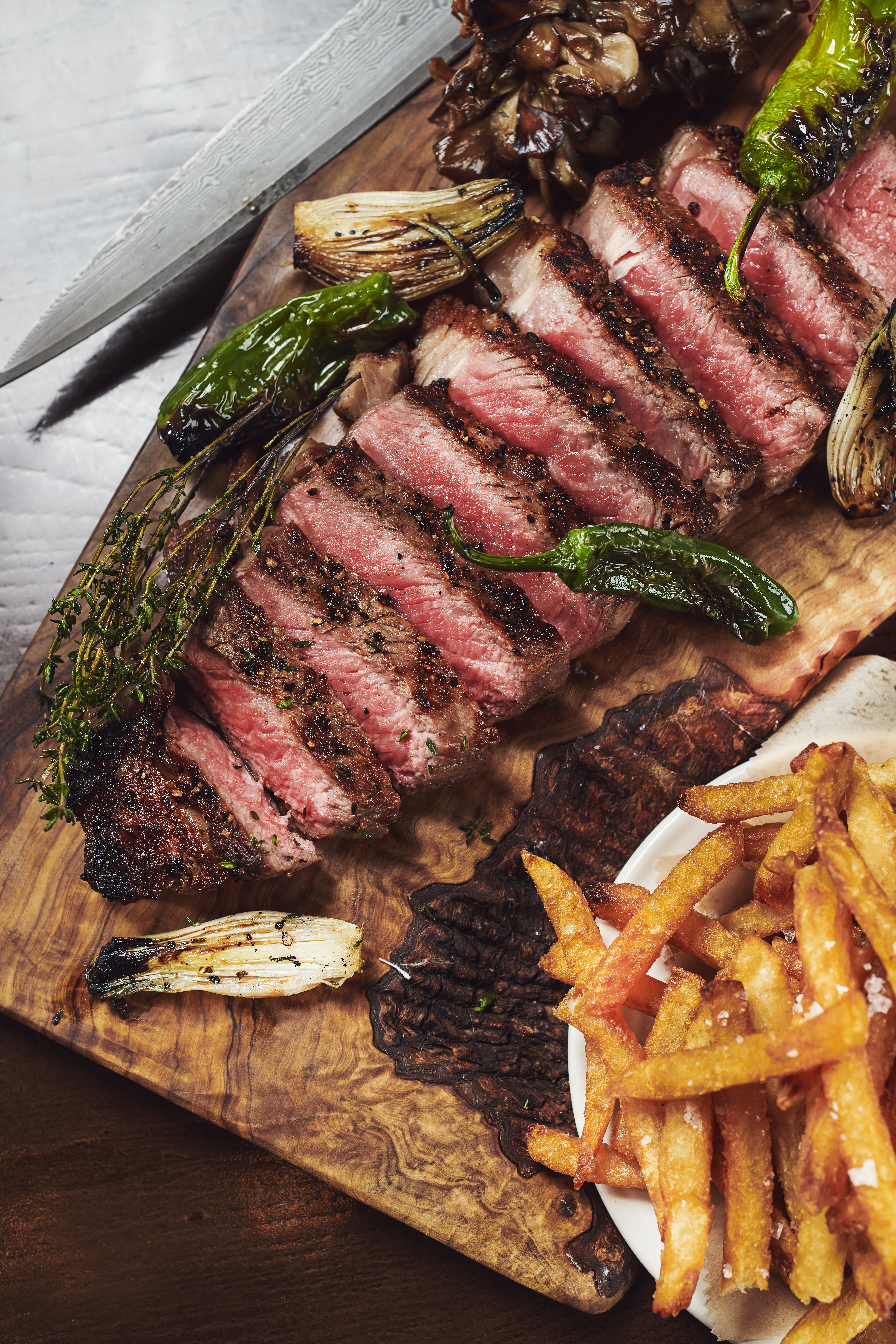 a plate of food with meat and vegetables