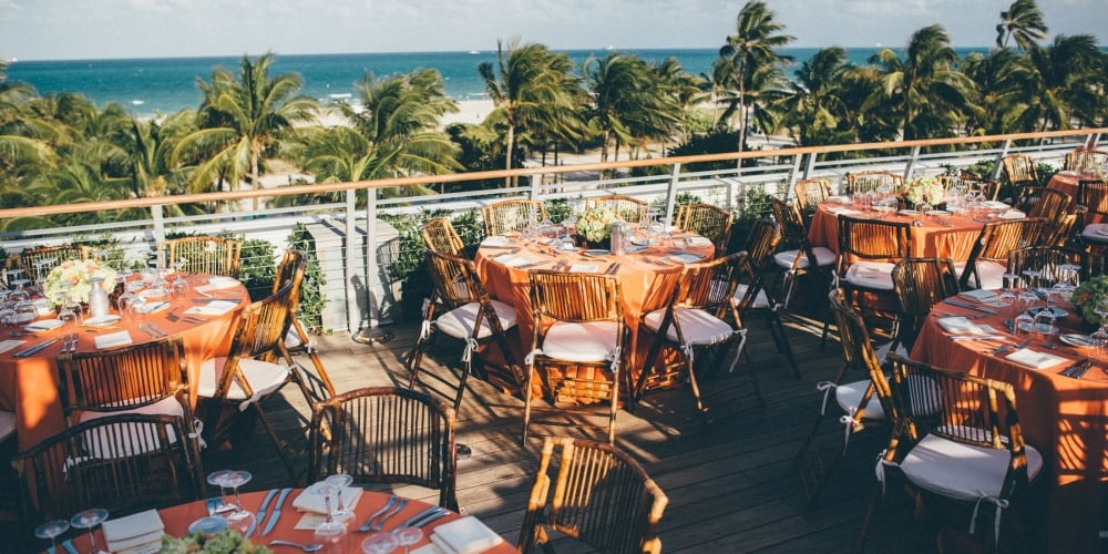 a dining room with tables and chairs