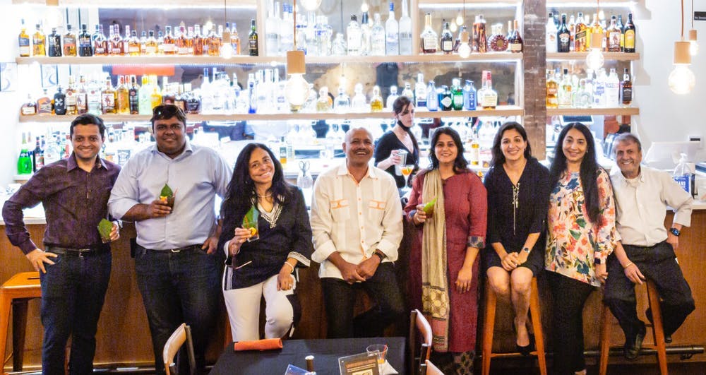 a group of people posing for the camera