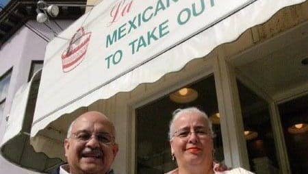 a person standing in front of a building