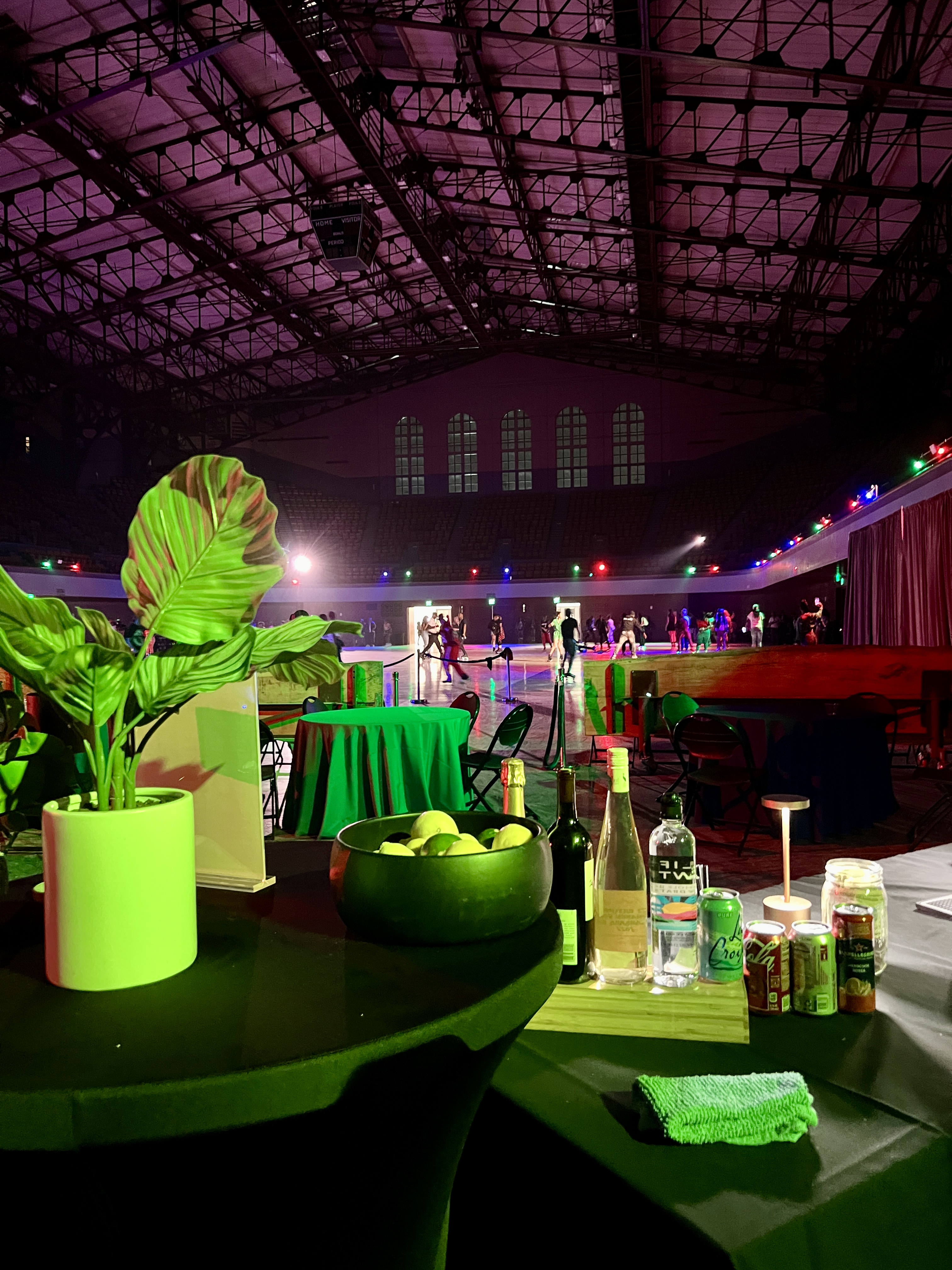 a group of people sitting at a table in a restaurant