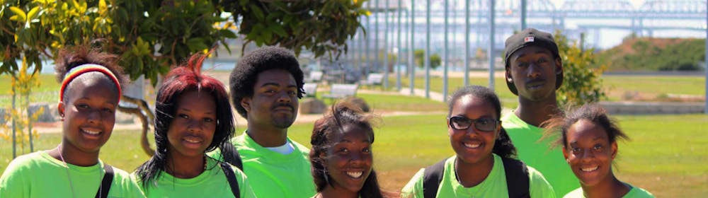 a group of people posing for the camera