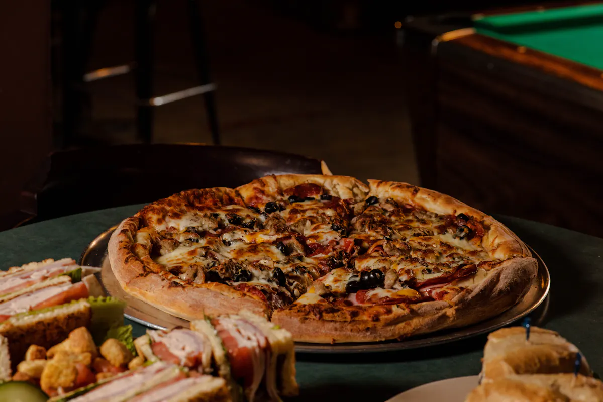 a pizza sitting on top of a table