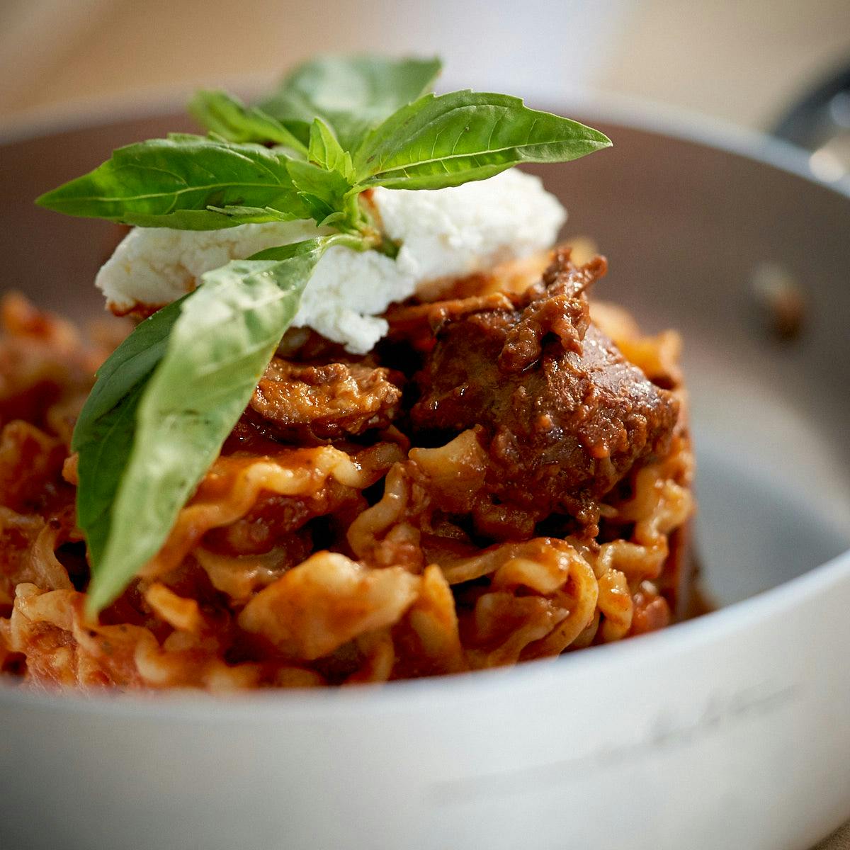 a close up of a bowl of food on a plate