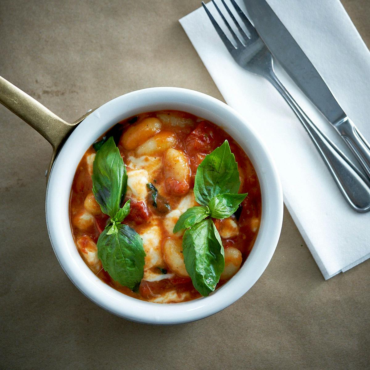 a bowl of soup on a table