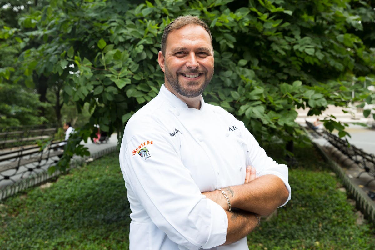 Chef Pasquale Cozzolino standing in a garden