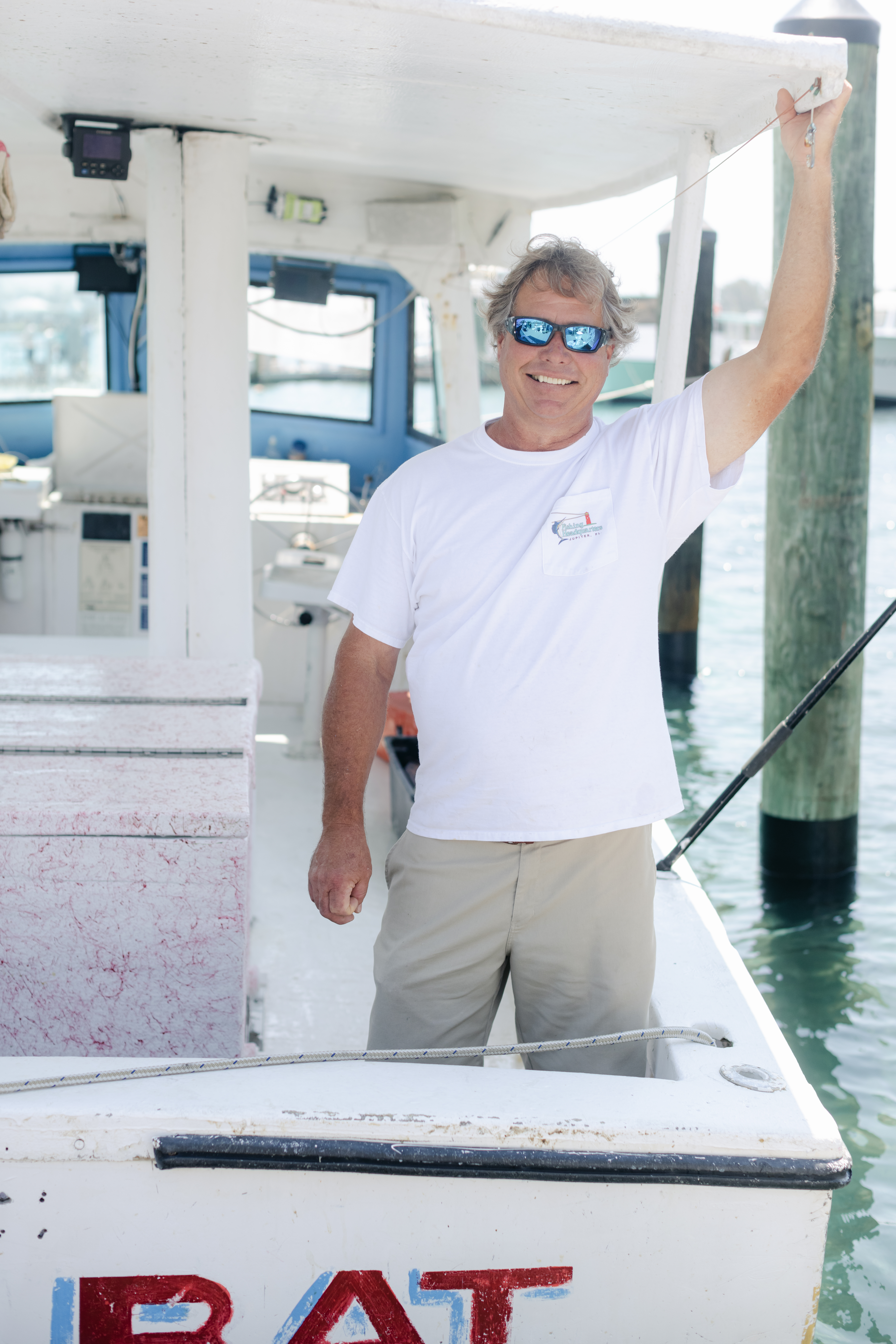 a man standing on a boat