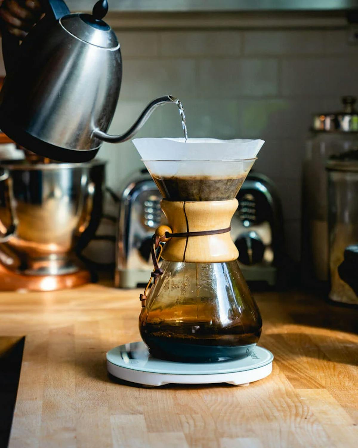 a blender sitting on top of a wooden table