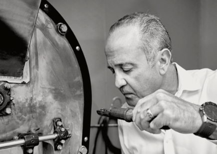 a man standing in front of a mirror