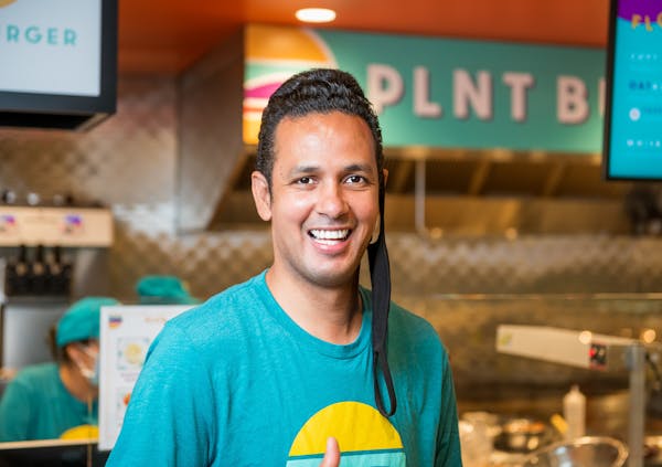 a man in a blue shirt