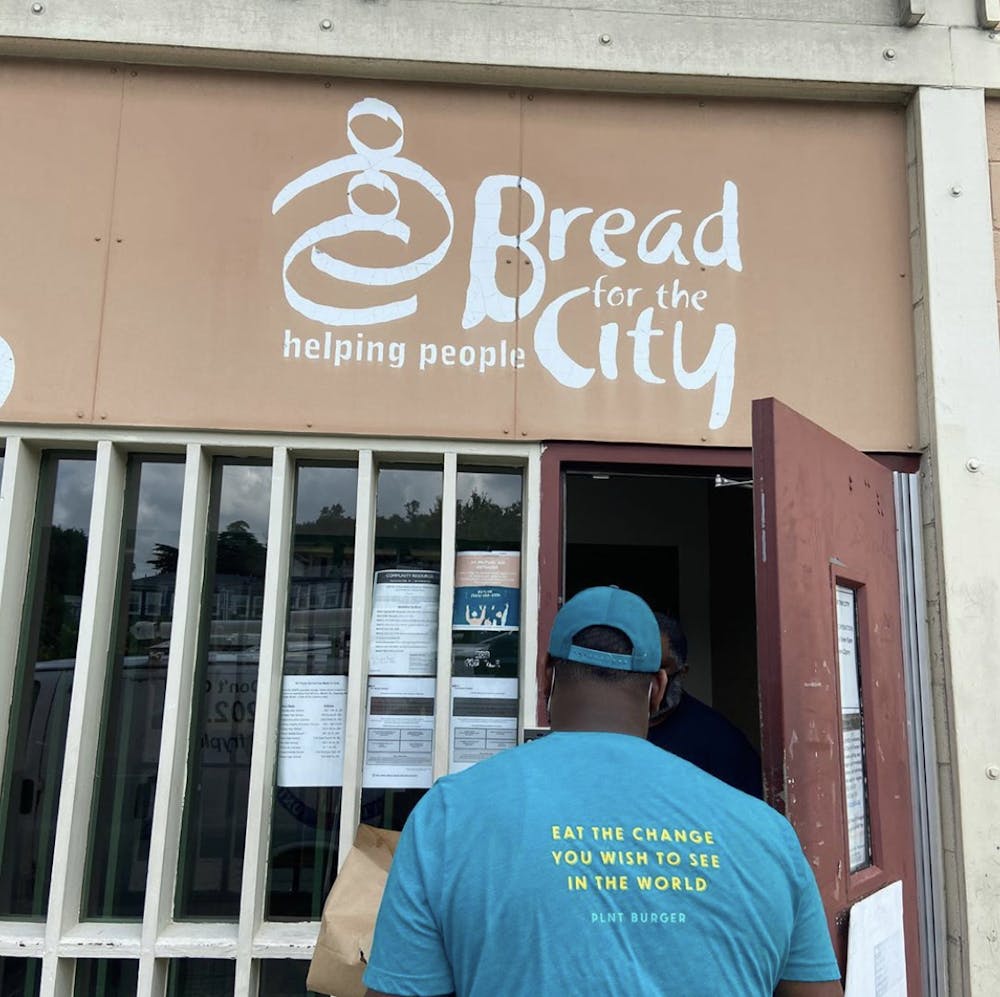 a person standing in front of a store