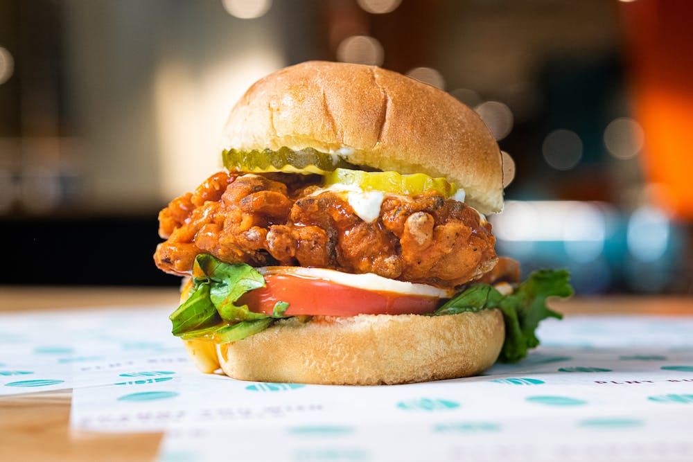 a close up of a sandwich sitting on top of a table