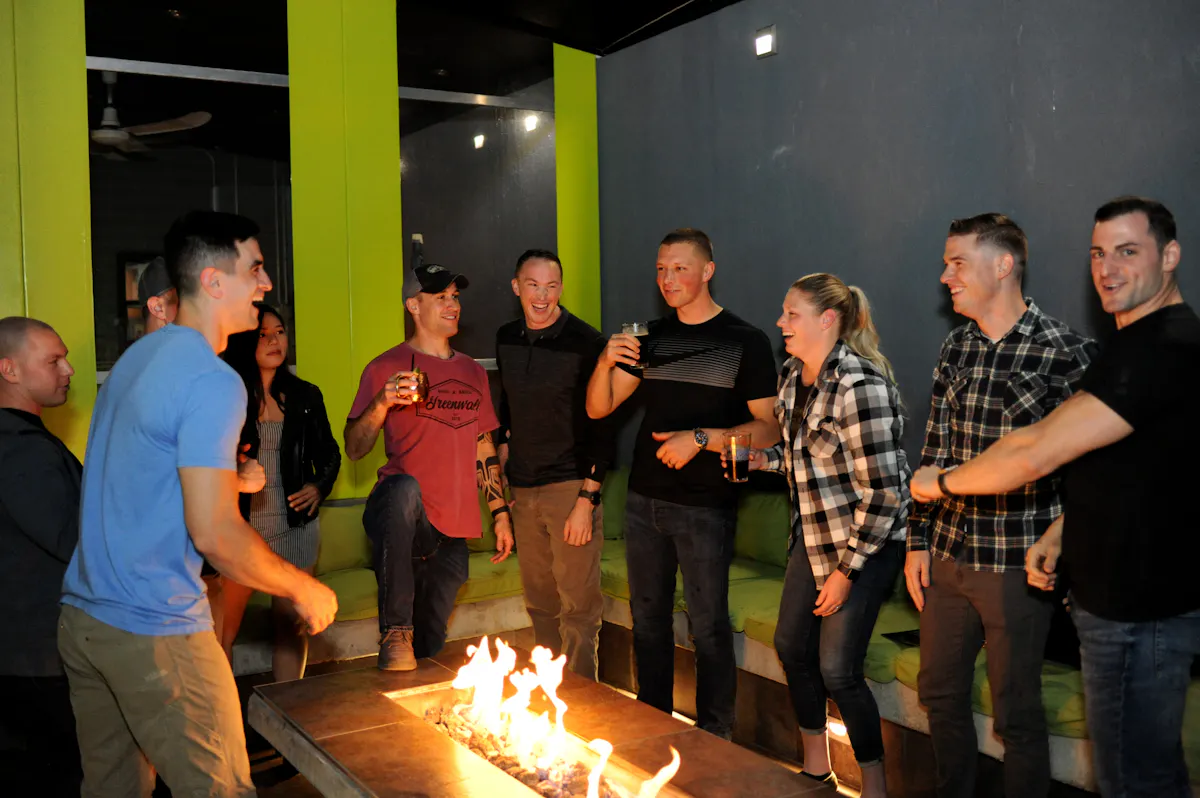 a group of people standing in a room