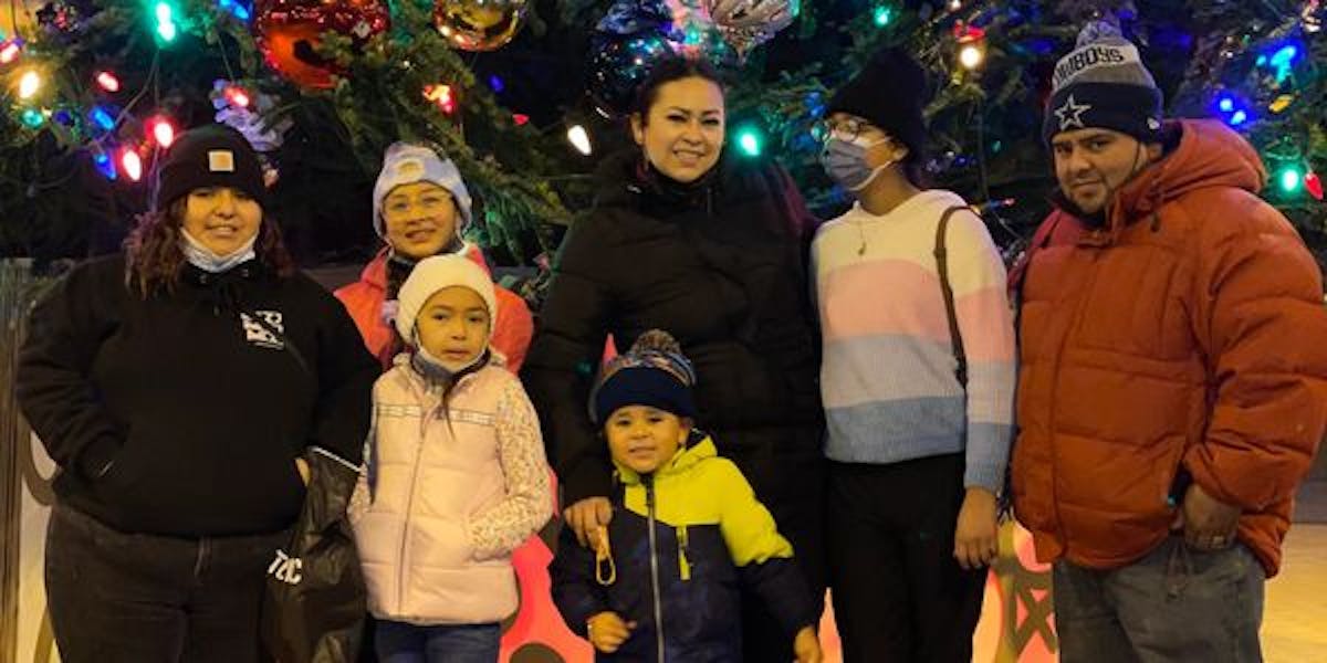 a group of people posing for the camera