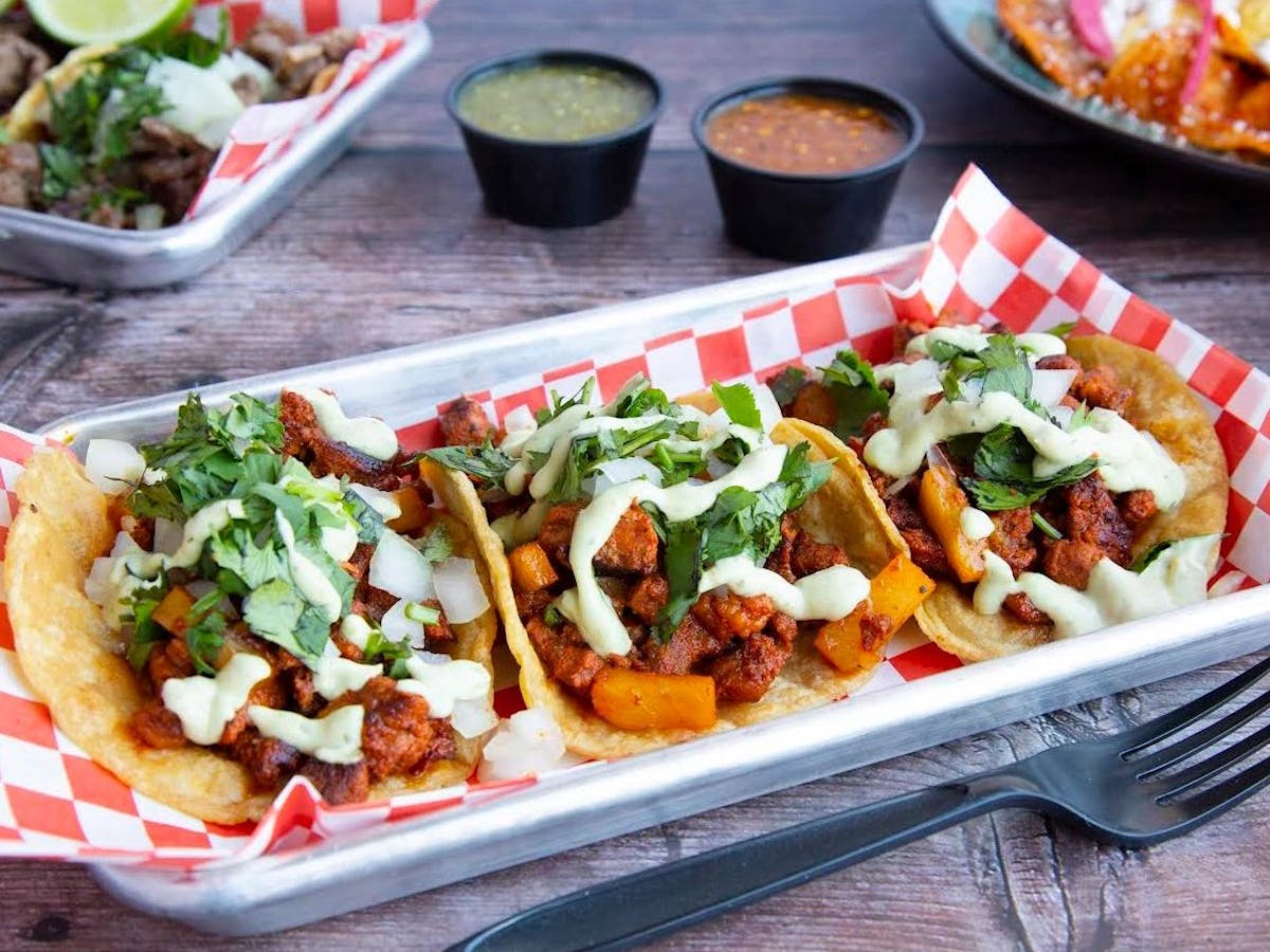 a close up of a tray of food on a table