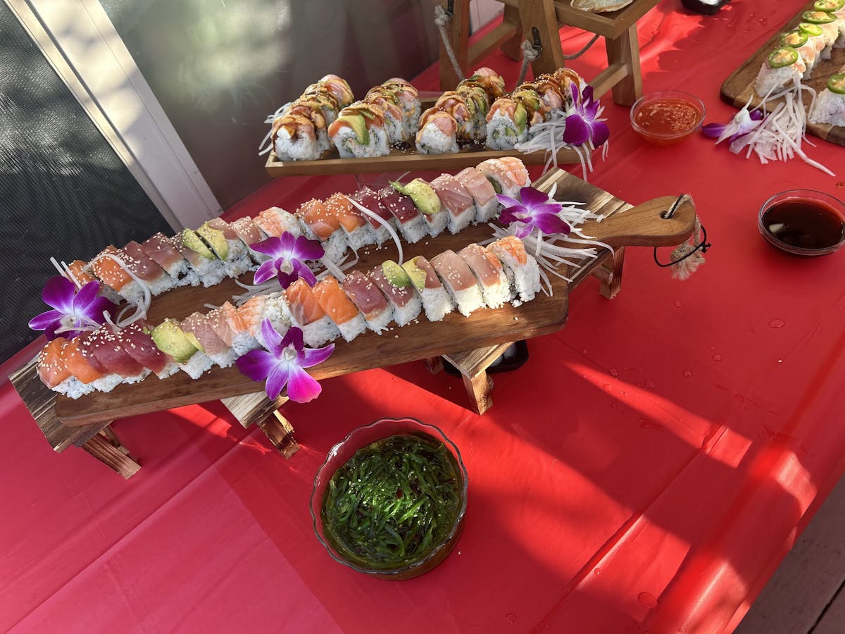 a group of pink flowers on a table