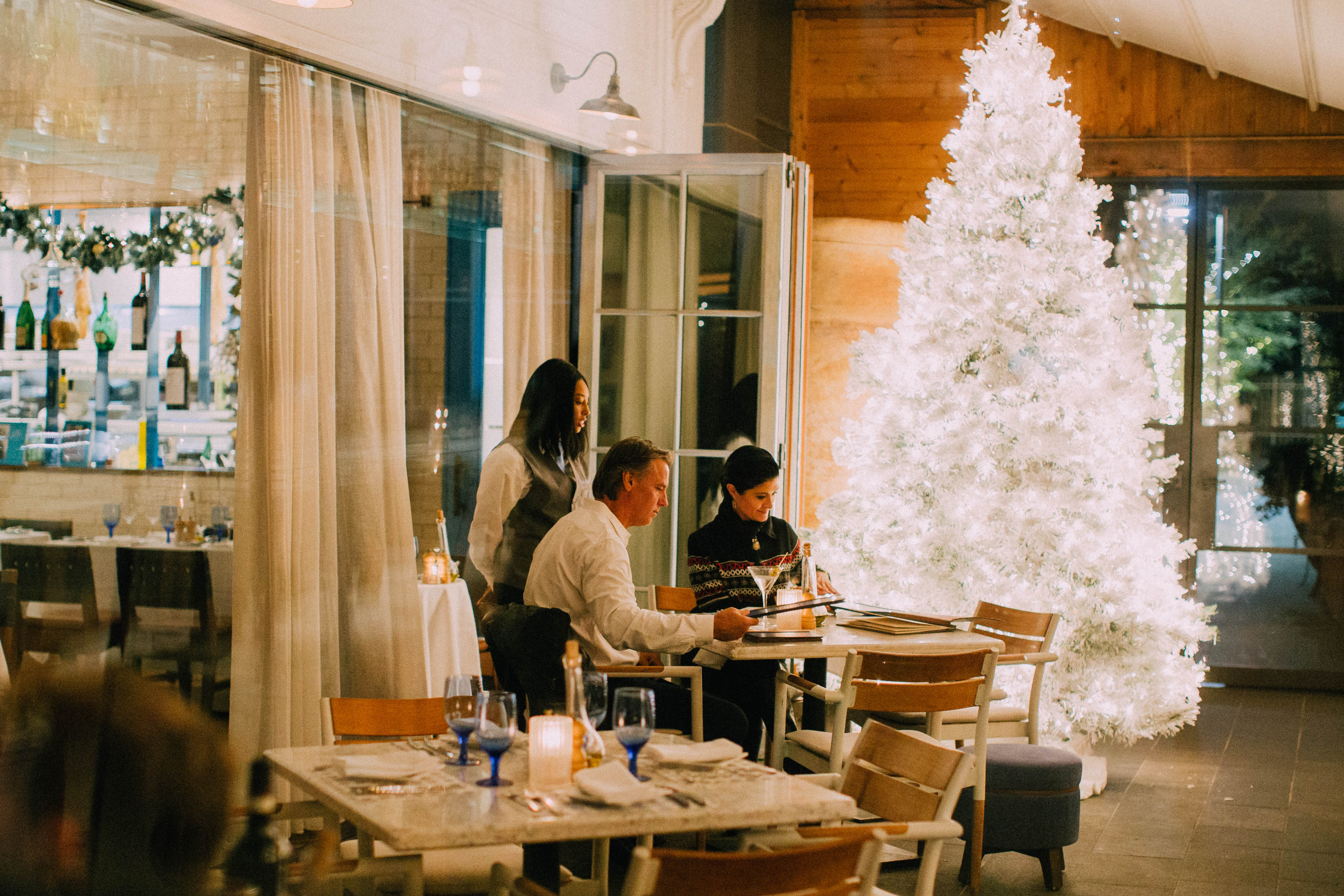a group of people sitting at a table