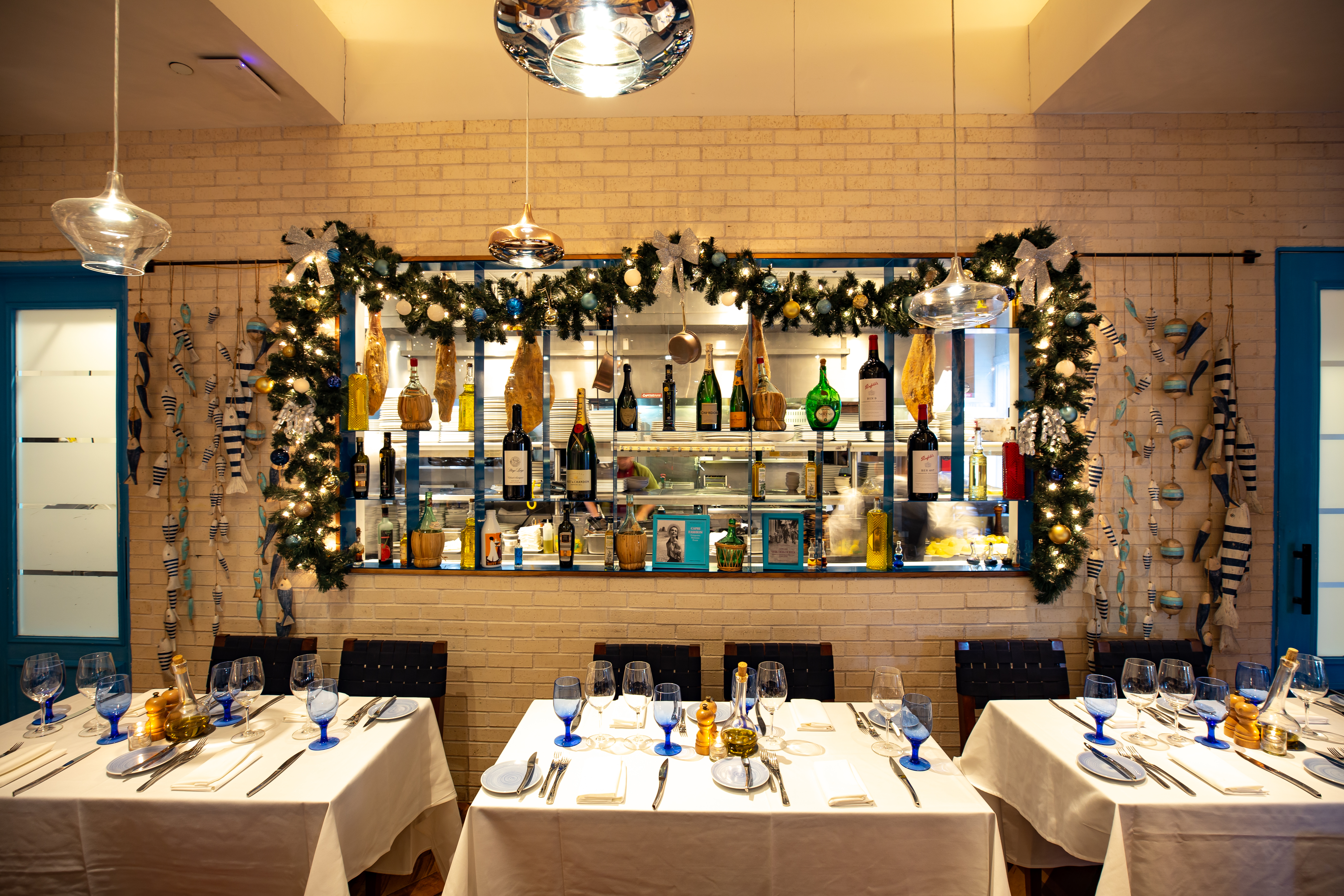 a kitchen with an island in the middle of a table