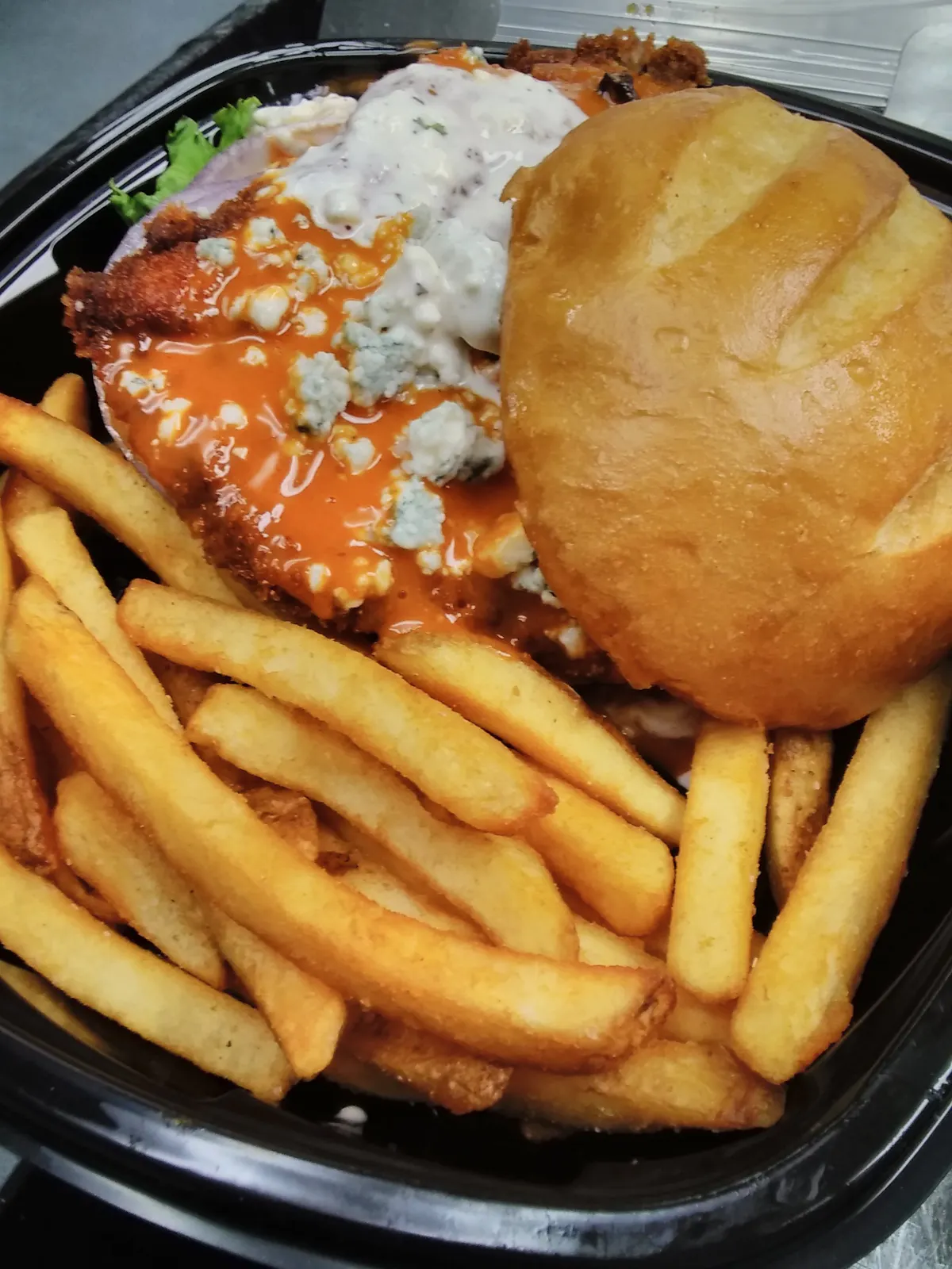 a sandwich and fries on a plate