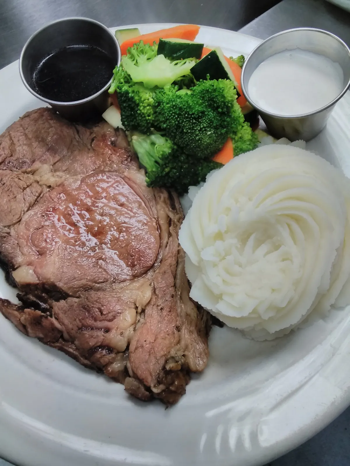 a plate of food with broccoli