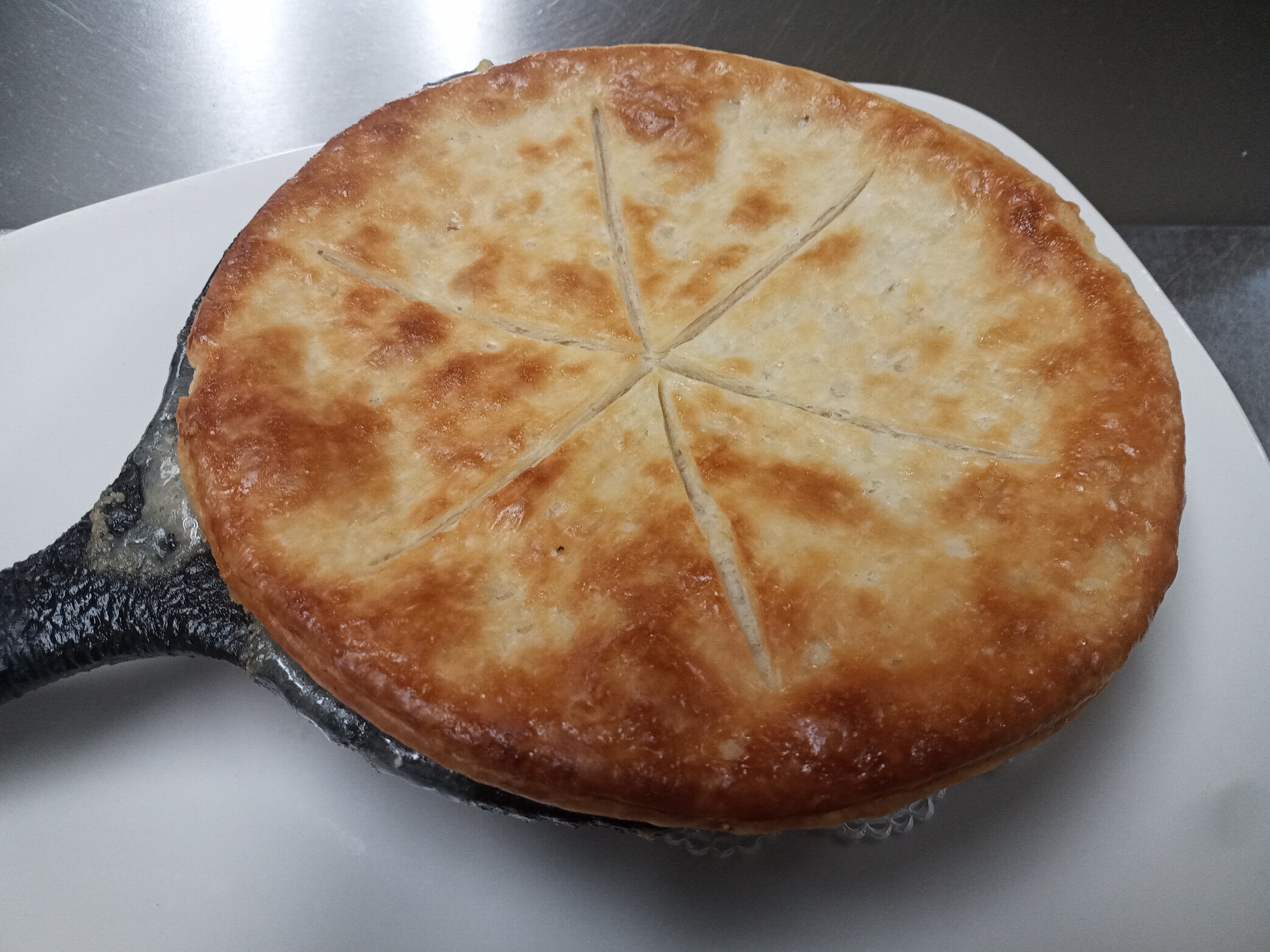 a close up of a plate of pizza