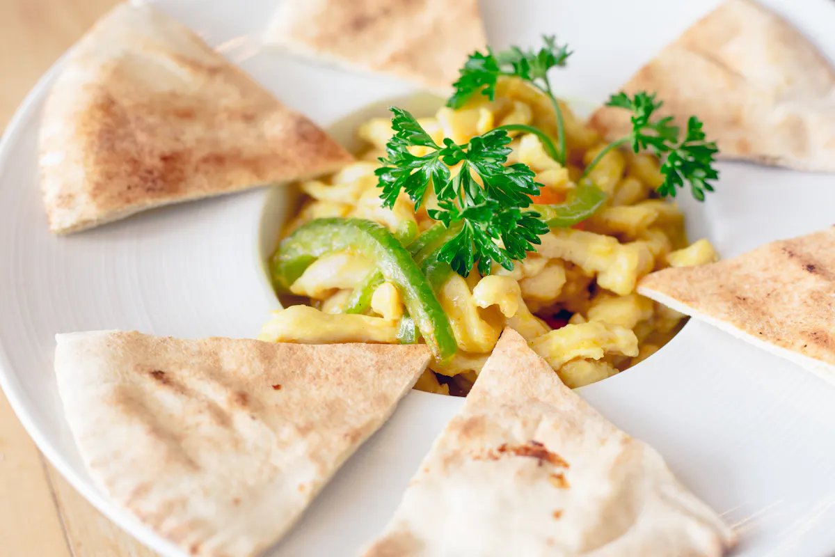 a plate of food with a slice cut out