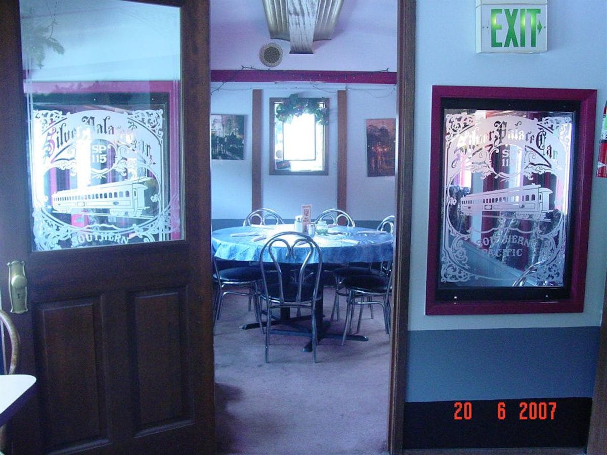 a clock sitting in the middle of a room