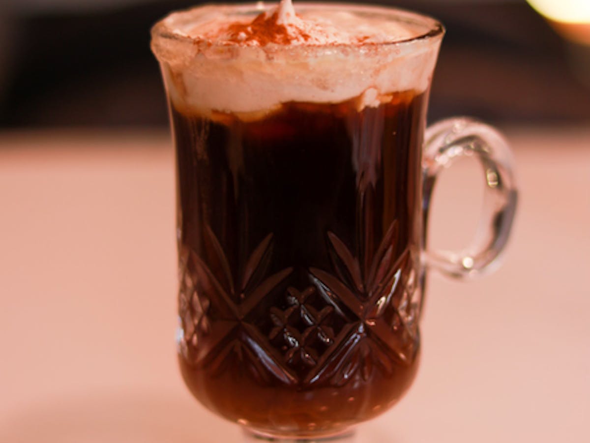 a glass cup on a table