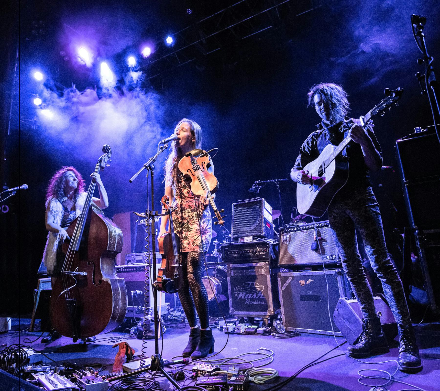 a group of people standing on a stage