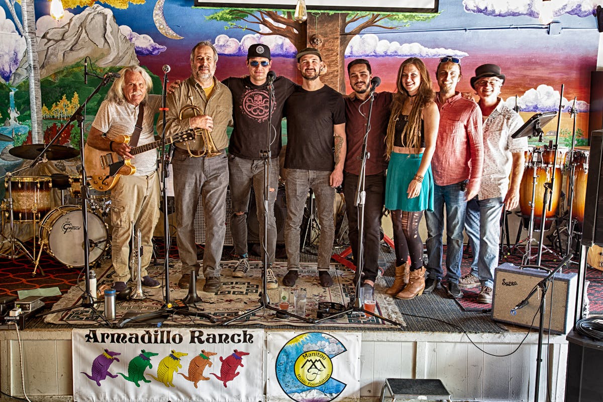 a group of people posing for a photo