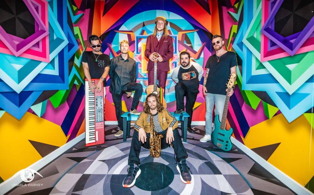 a group of people posing for the camera