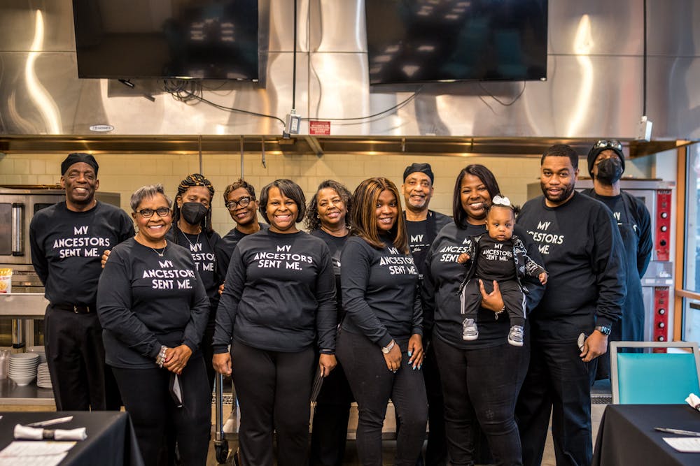 a group of people posing for the camera