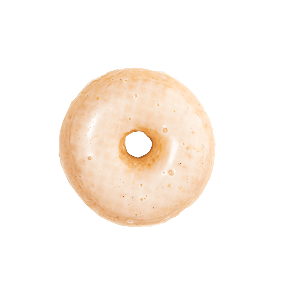 a single donut in a dark room