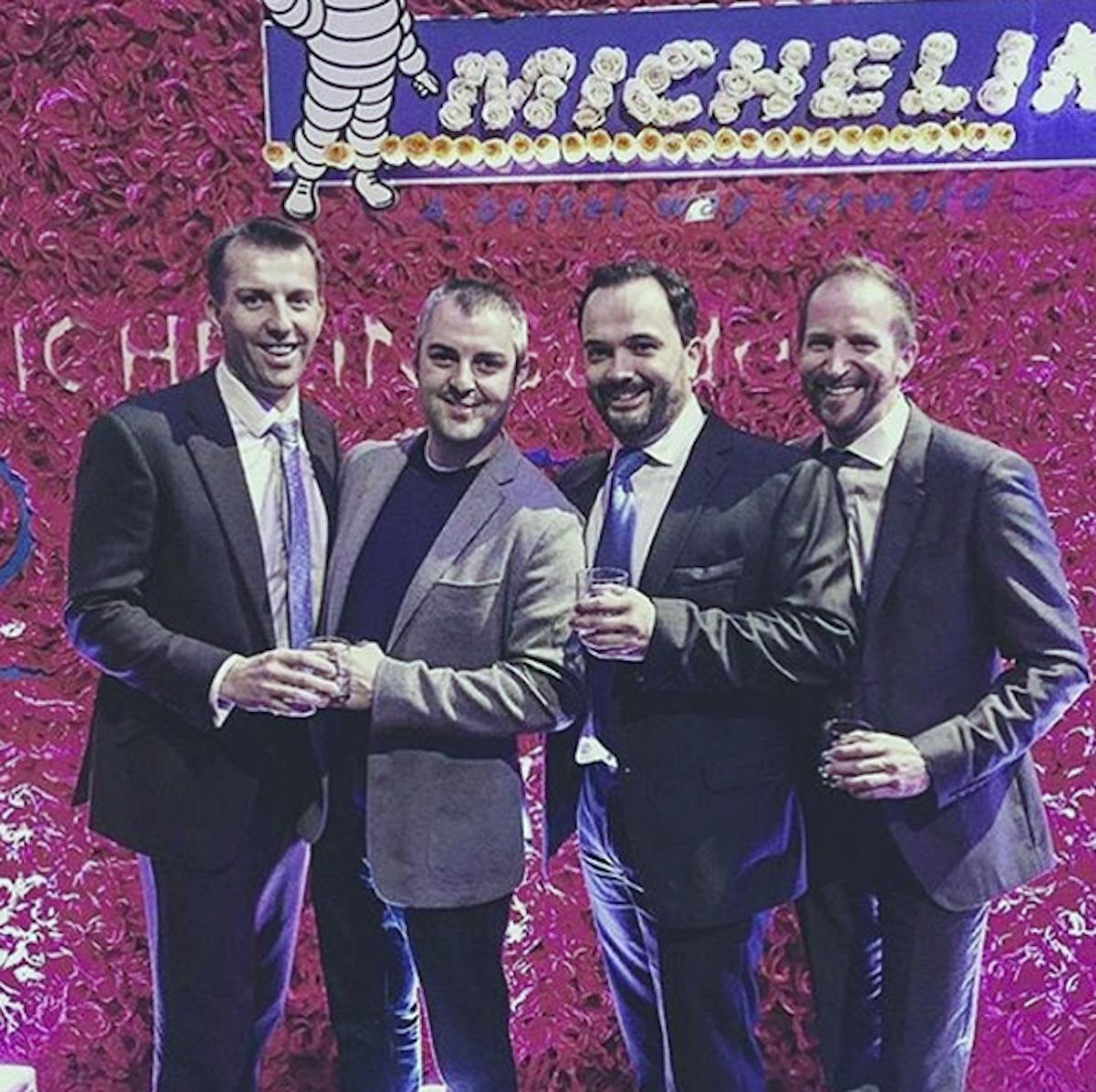 a group of people posing for a photo