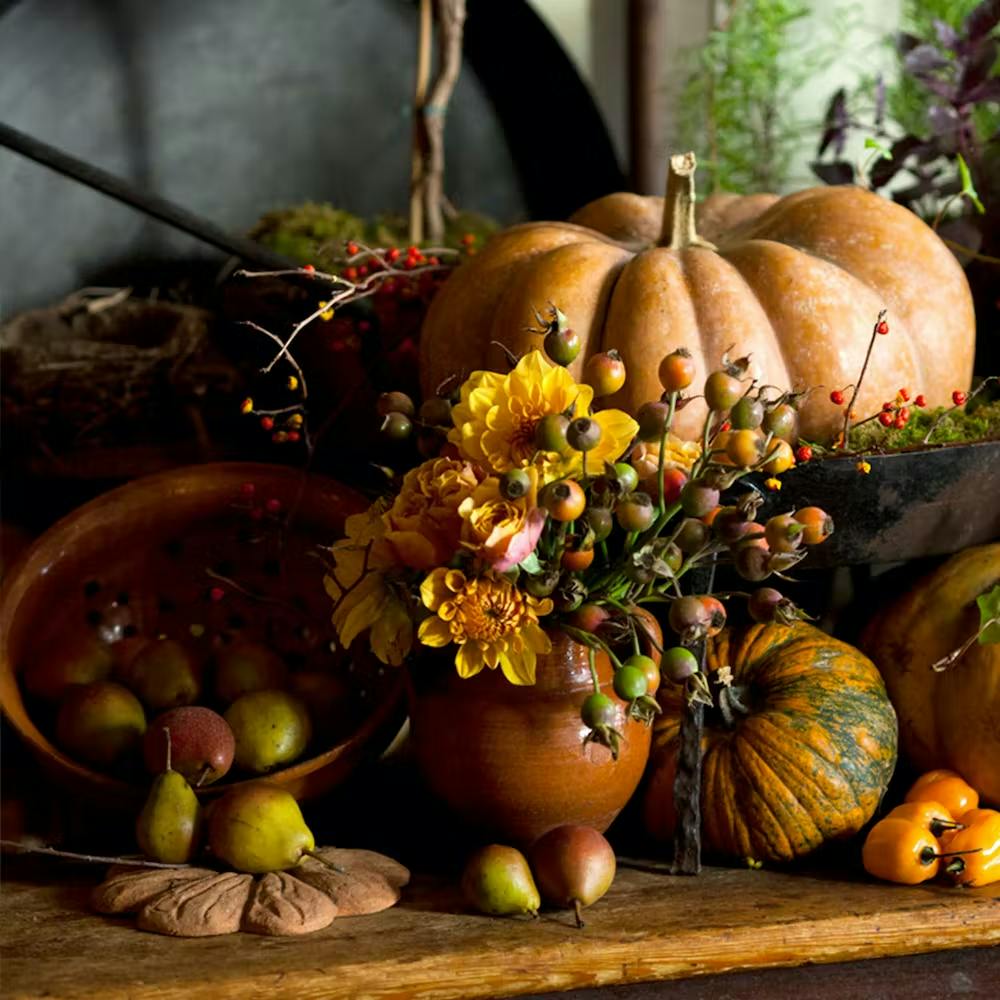 a bunch of fruit sitting on top of a wooden table