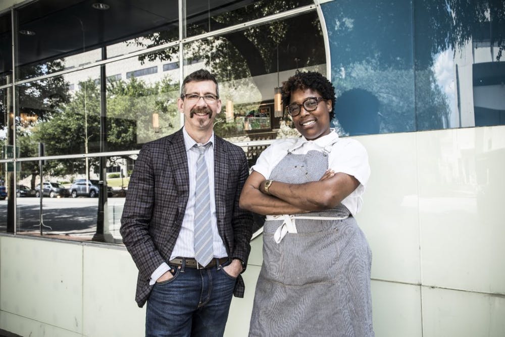 Chef Mashama Bailey and Johno Morisano standing in front of a building