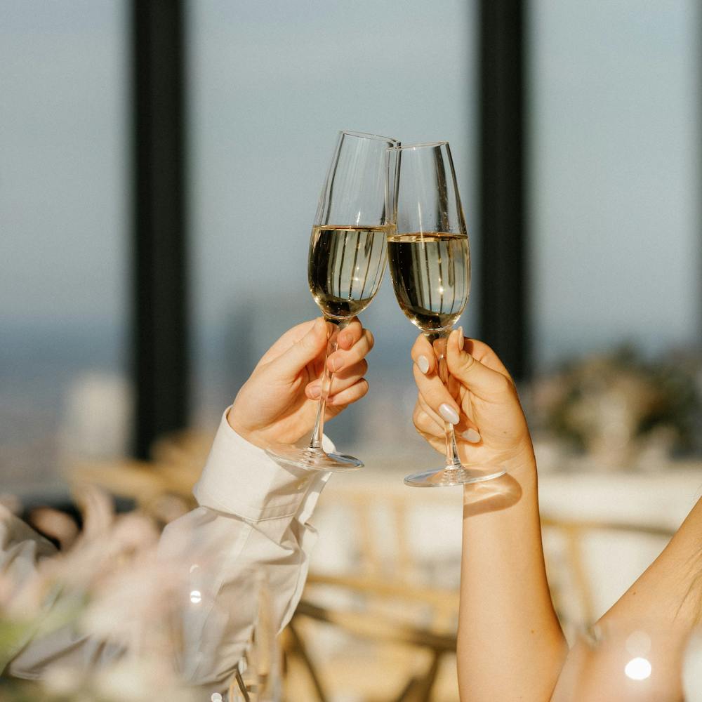 a hand holding a baby