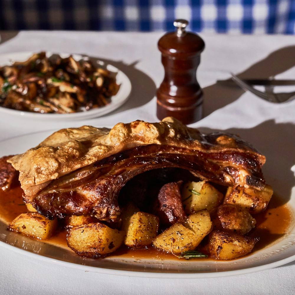 a bunch of fruit sitting on top of a wooden table