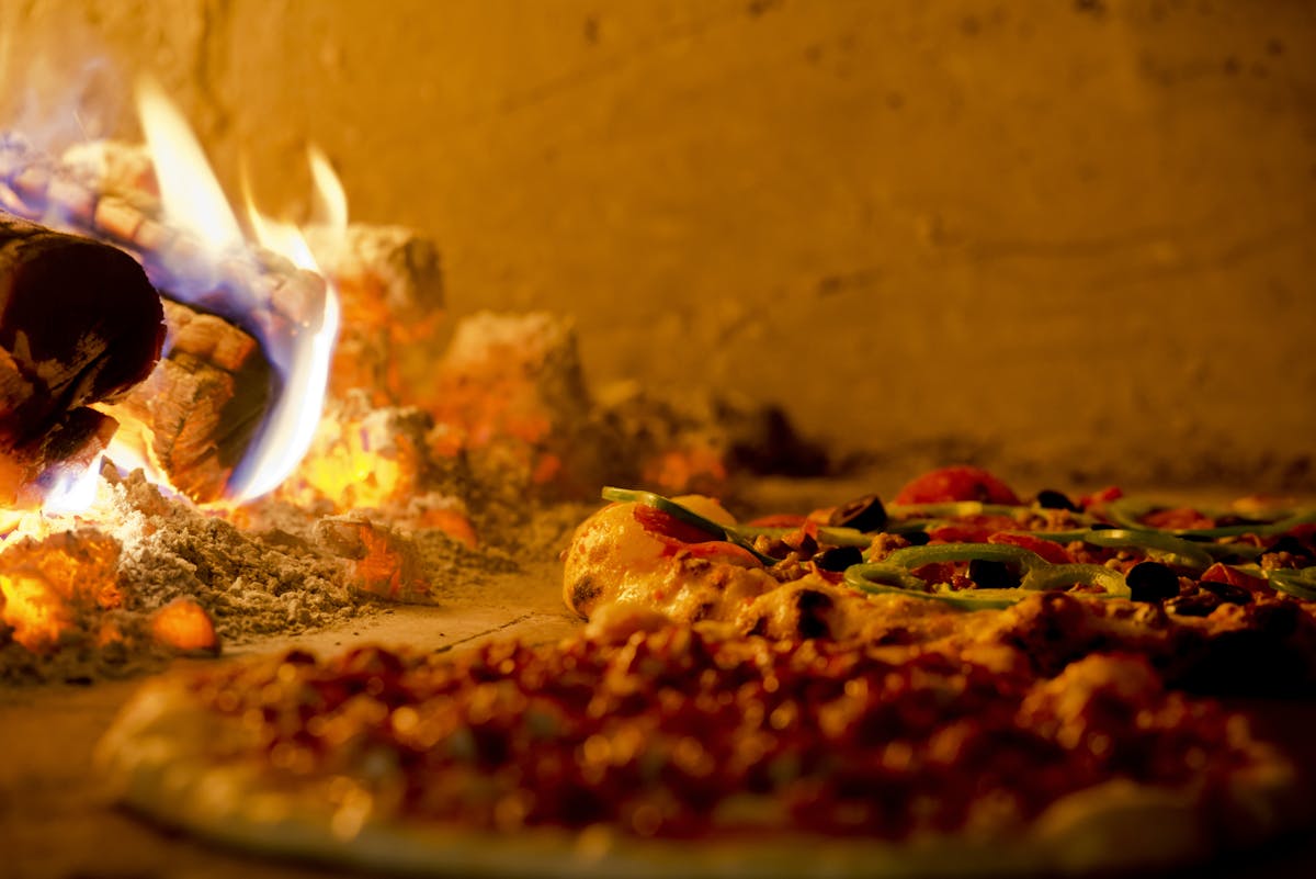 a close up of a slice of pizza