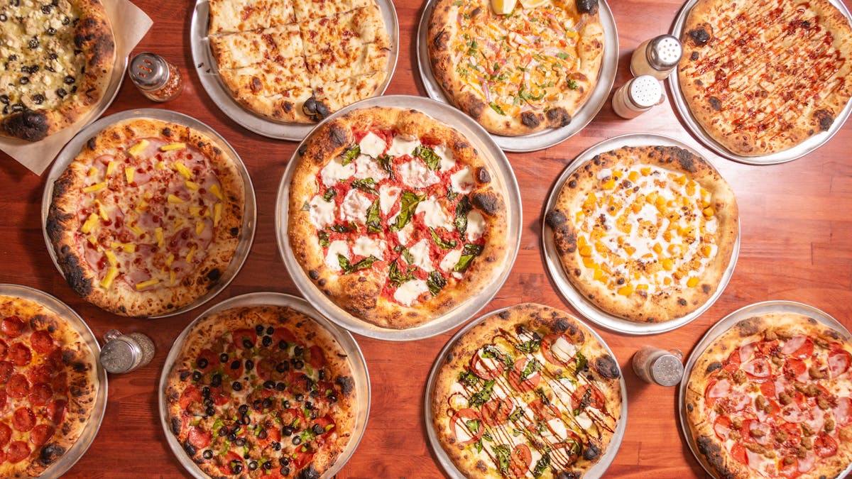many different types of food on a wooden table
