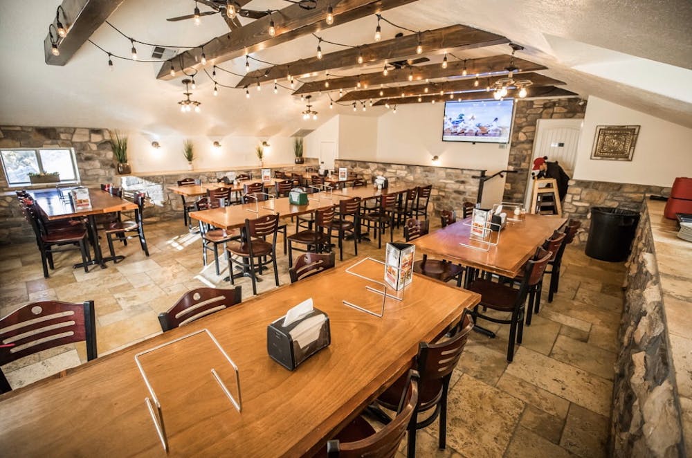 a living room filled with furniture and a table