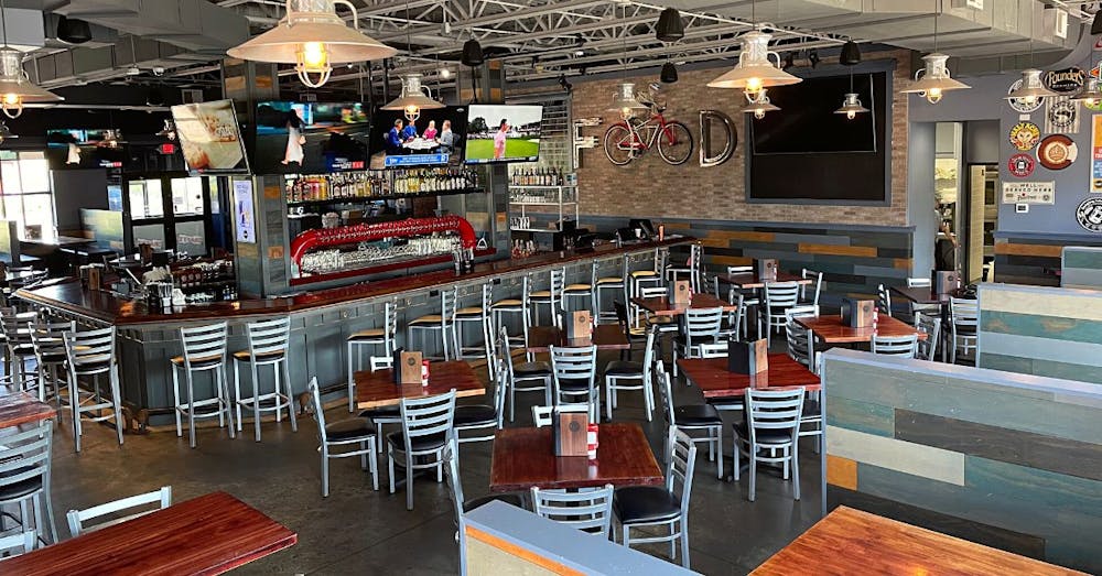 a dining room table in front of a building