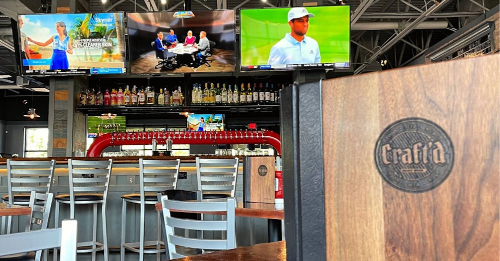 a chair sitting in front of a building