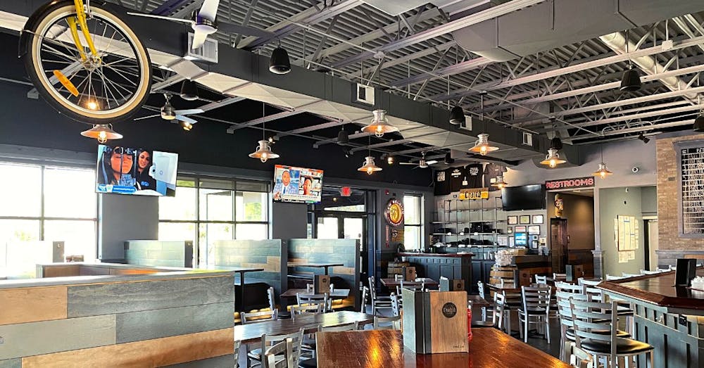 a kitchen area with a building in the background