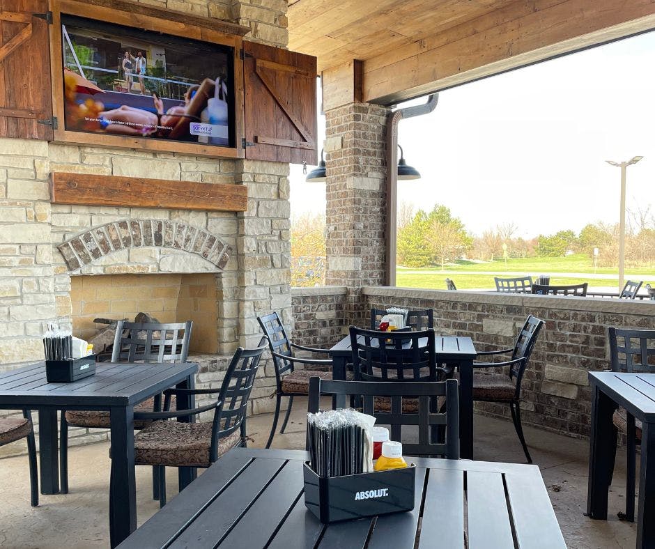 a dining room table in front of a building