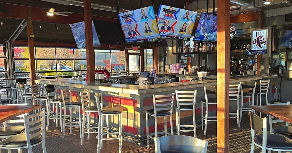 a chair sitting in front of a store